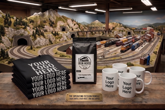 Promotional product bundle with branded merchandise in front of a model train set.